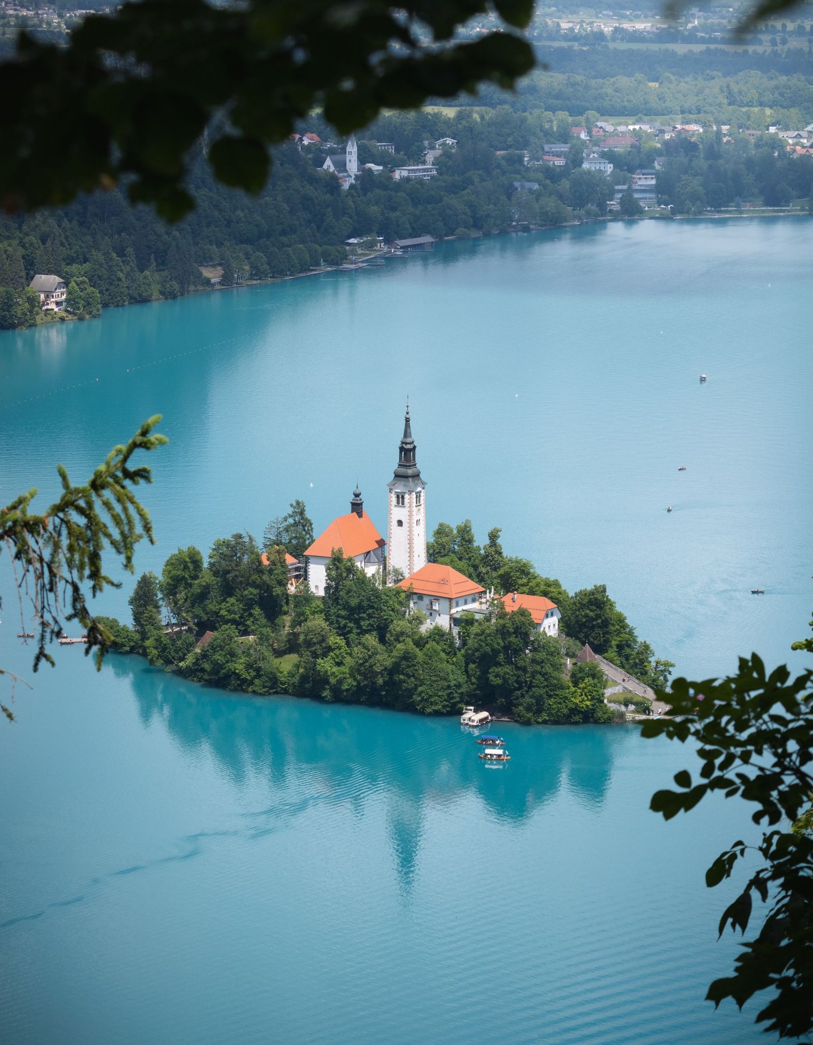 Explore Slovenia 2 Lake Bled island and church surrounded by turquoise water in Slovenia
