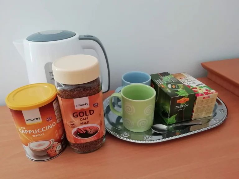 Kettle and tea and coffee supplies — available in both rooms