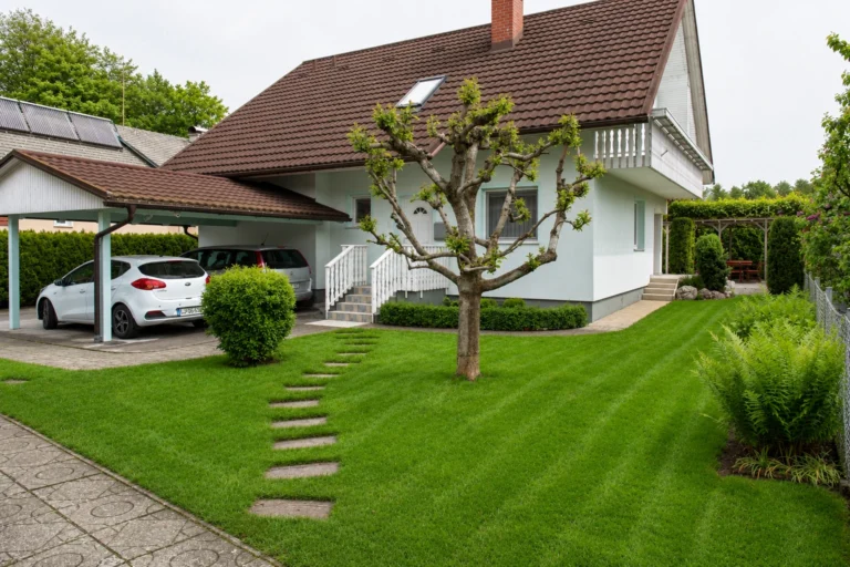 House exterior, garden and covered parking