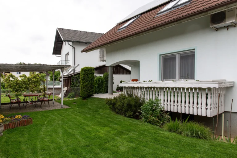 House and lawn beside the terrace